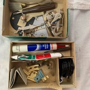 vintage box of Singer sewing machine attachments/parts